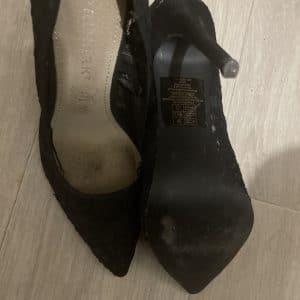 Paire de talon de domination avec semelle sale