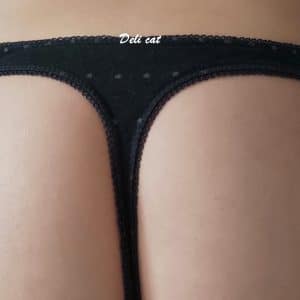 Tanga string noir étoiles grises
